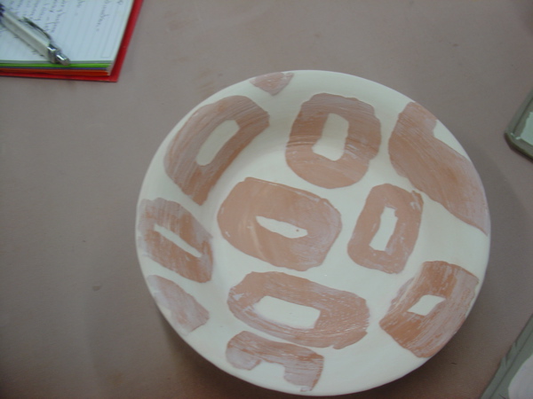 wax-etching-over-colored-slip-on-porcelain