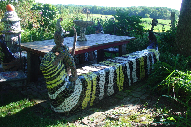 caterpillar bench- with a monkey on the caterpillar