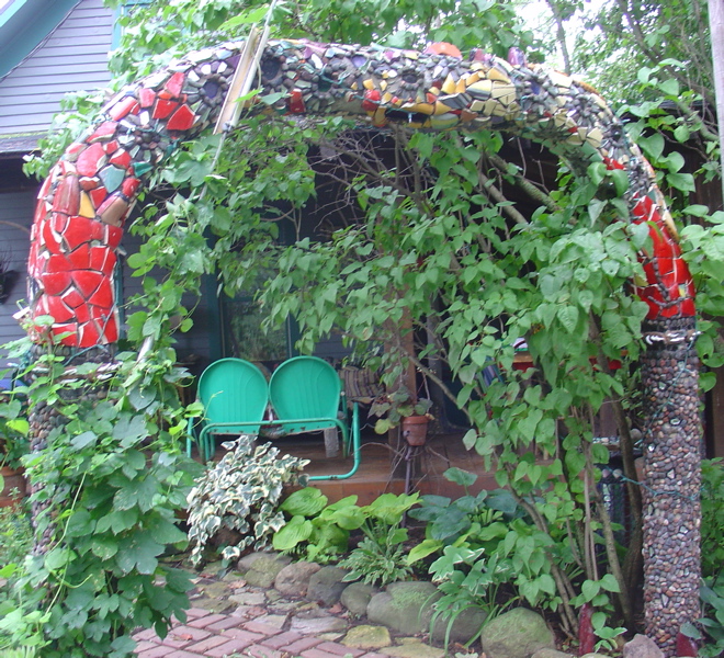 the arch with the cone packs - framing a view of the back porch